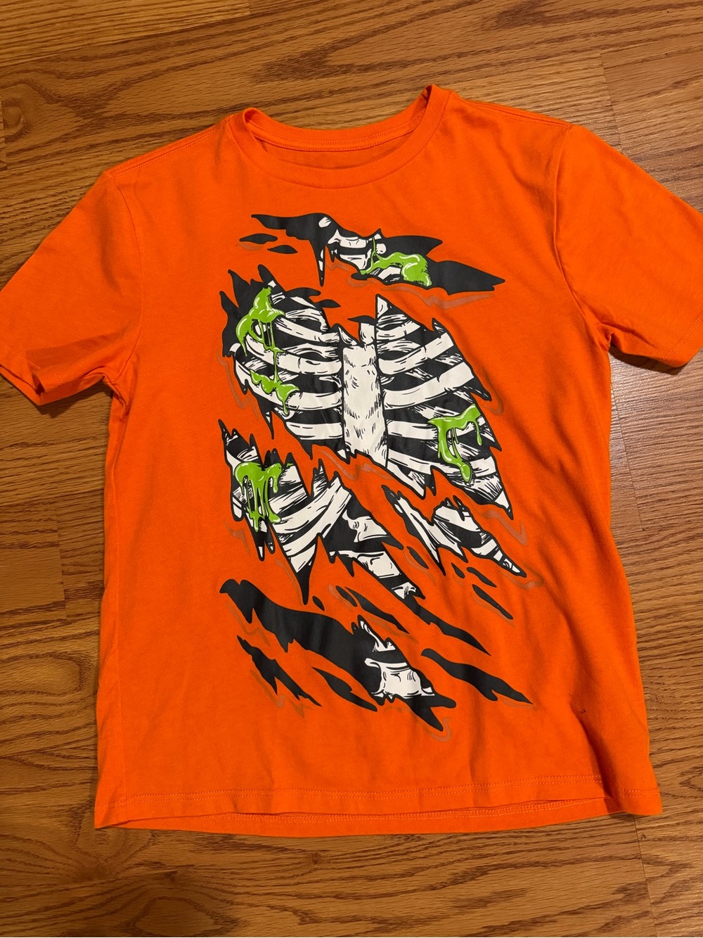 Kids Orange Short Sleeve Tee with Skeleton Rib Cage Graphic